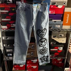 Men's Light Blue Jeans with Black Graphic